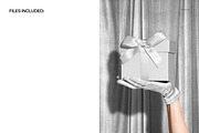 Christmas Gift on Gloved Hand Mockup, a Packaging Mockup by creatsy5 (Thumbnail 2 of 6)