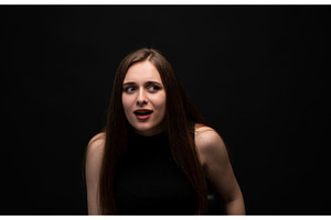 Young woman showing an expression of, a Person Photo by volodymyrshtun13795