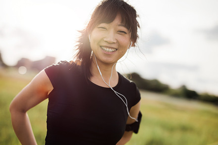 Happy female running, a Sports & Recreation Photo by Jacob Lund