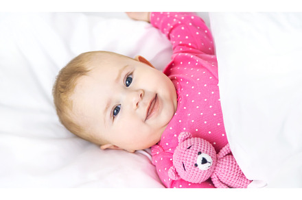 Baby toddler plays in the crib, a Person Photo by yanadjana