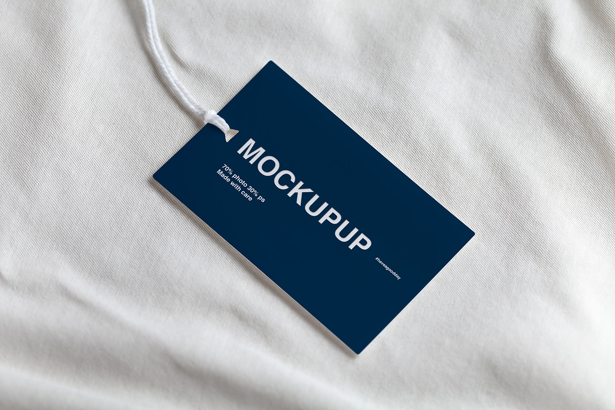 Clothes label tag blank white mockup, an Advertising Mockup by Olha Klein (Photo 3 of 3)