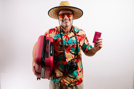 Smiling man ready for tropical vacation adventure