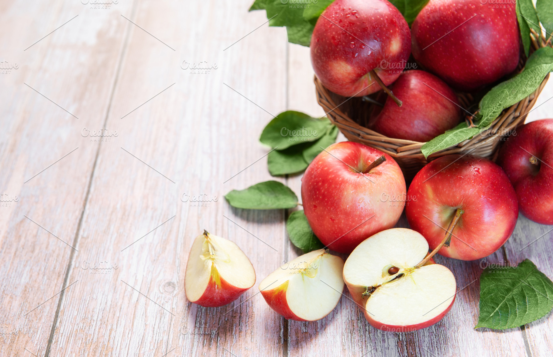 Healthy red apples harvest on rustic wood table, a Food & Drink Photo by Olena Rudo