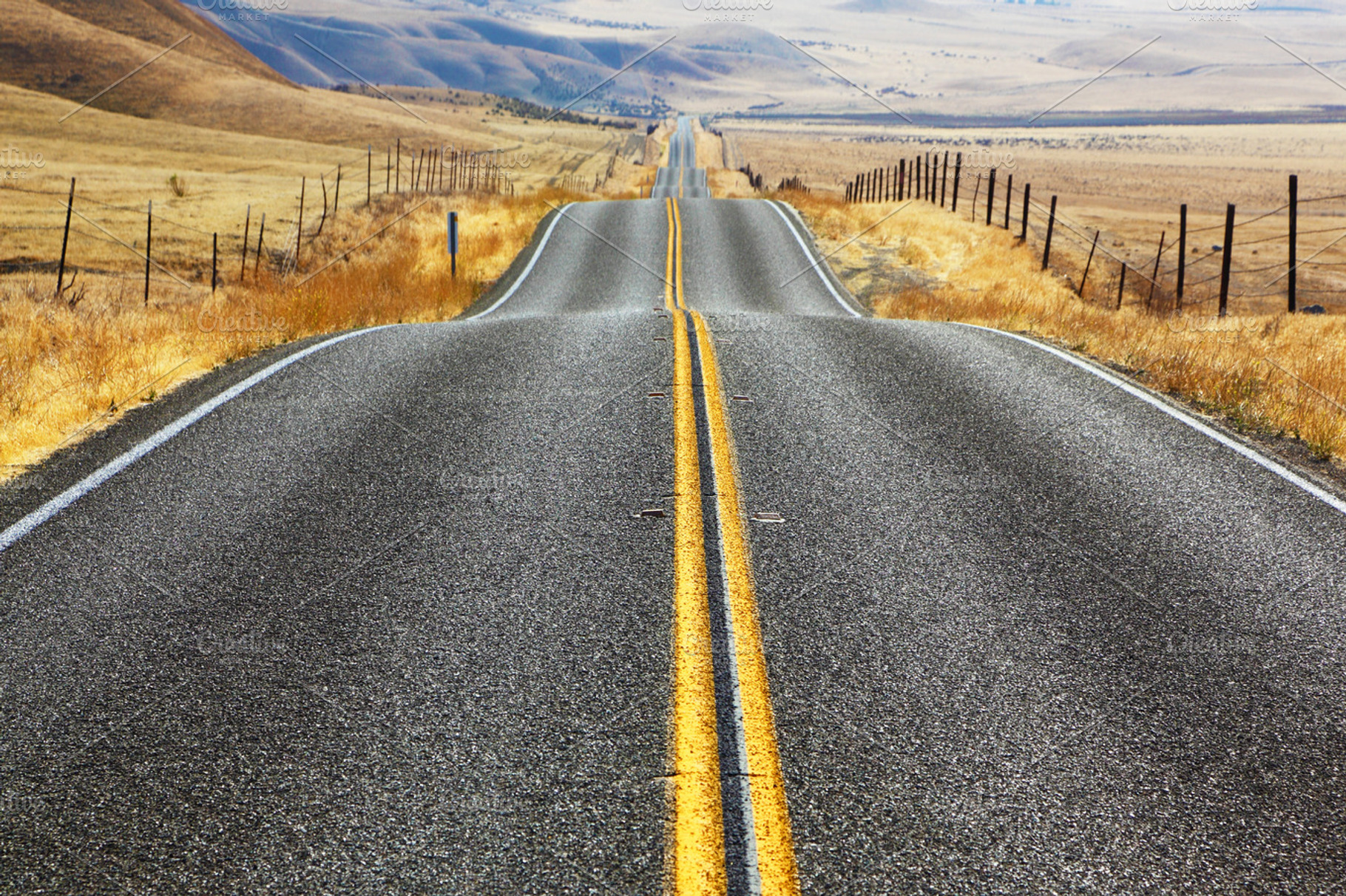 Magnificent american road featuring hill, fence, and road, a Transportation Photo by kavram
