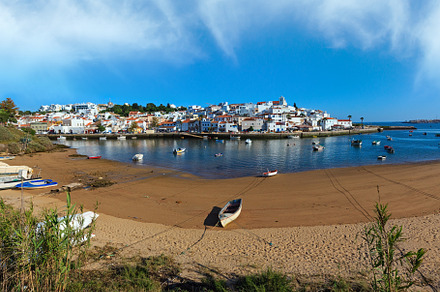 Ferragudo fishing village evening summer view with boats on wate, a Nature Photo by YuriyB