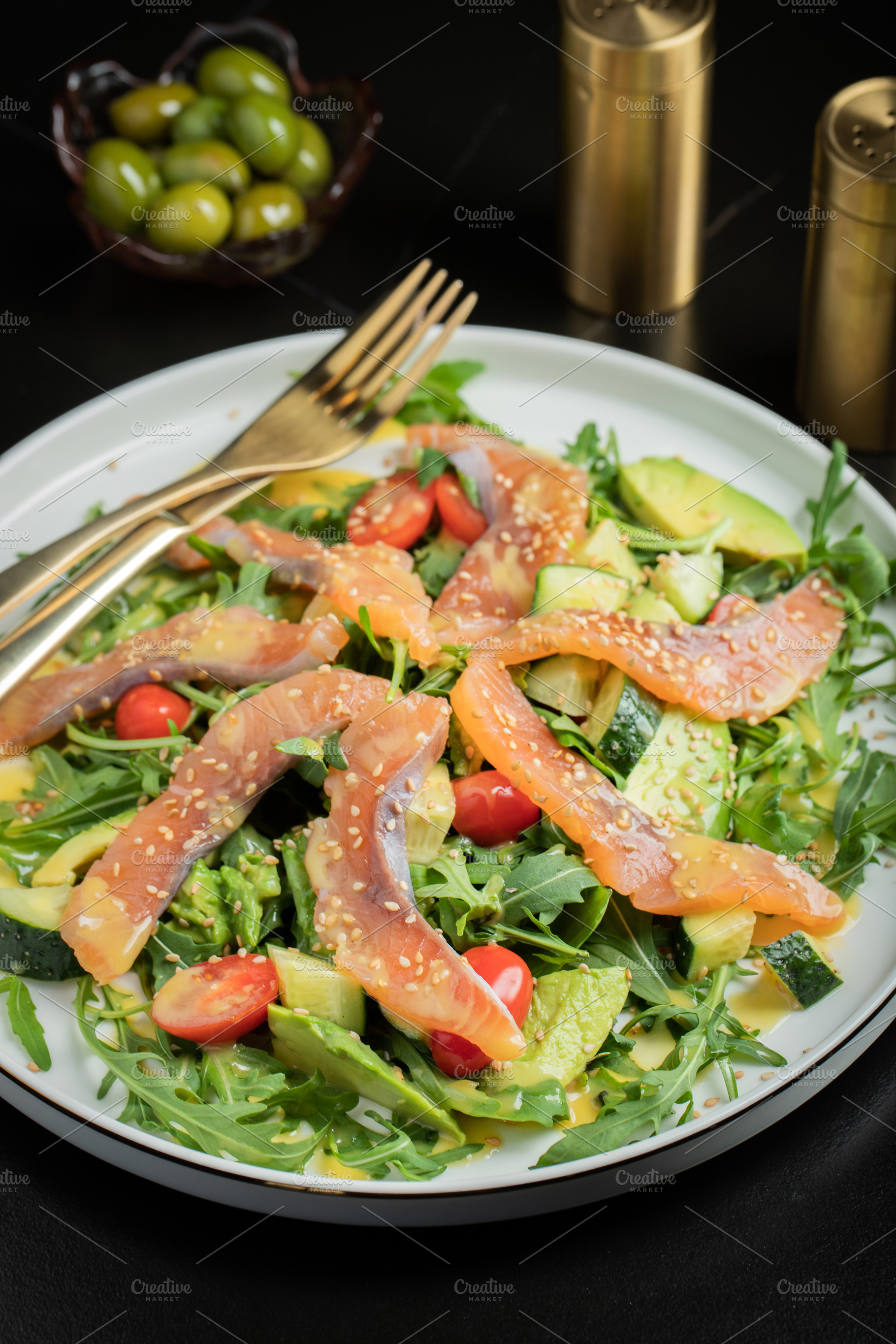 Salad with salted salmon and arugula, a Food & Drink Photo by Budarinphoto