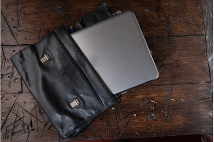 Leather business briefcase on the