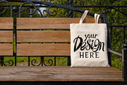 Rustic tote bag on the garden bench, a Photo by TasiPas (Thumbnail 2 of 4)