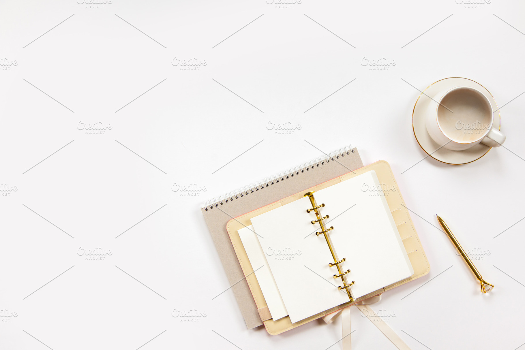 Notepad and beige leather covered diary with clean sheets, gold, a Business Photo by Natalia Kostikova