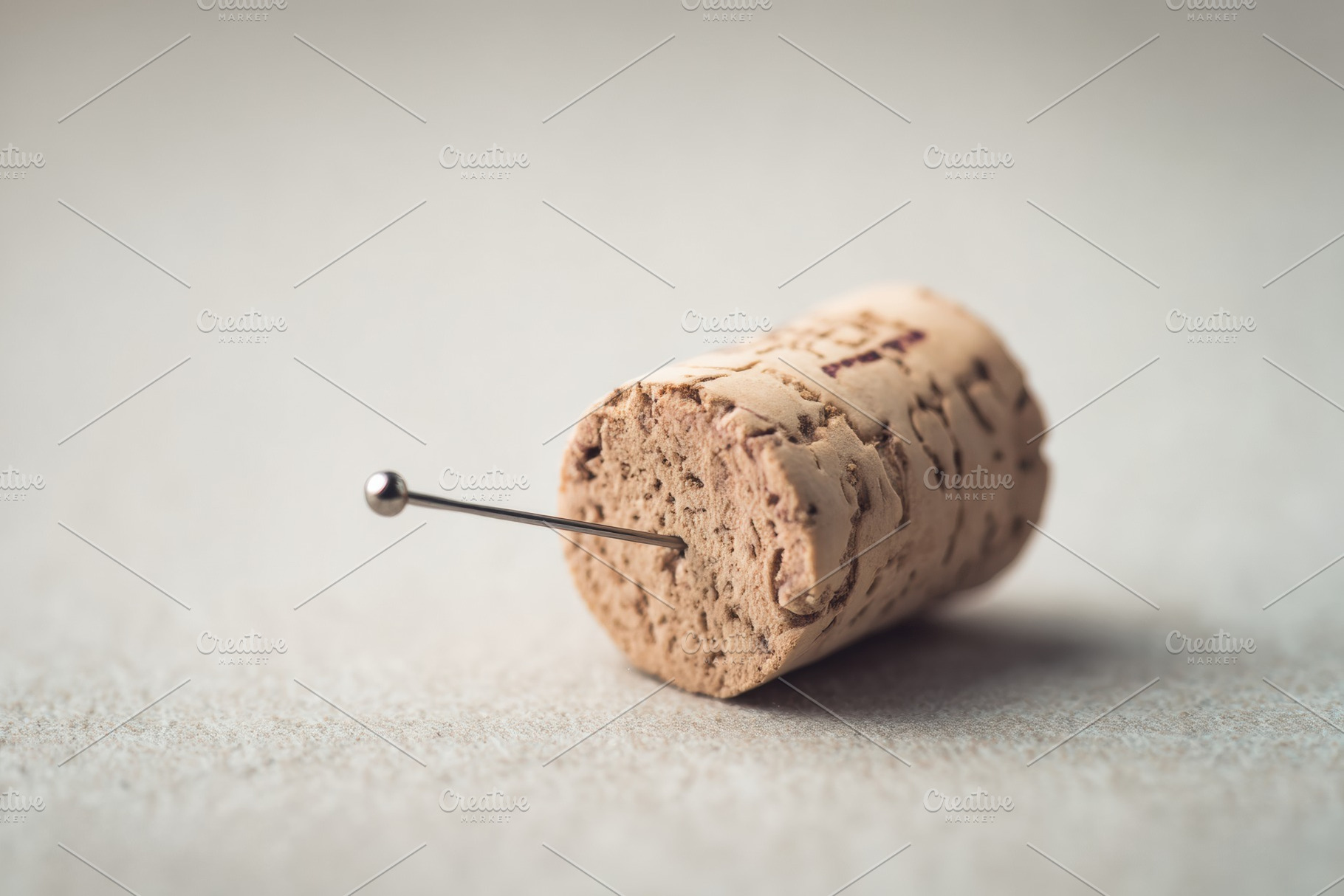 Cork and Needle, Neutral Background, a Photo by Virgo Studio