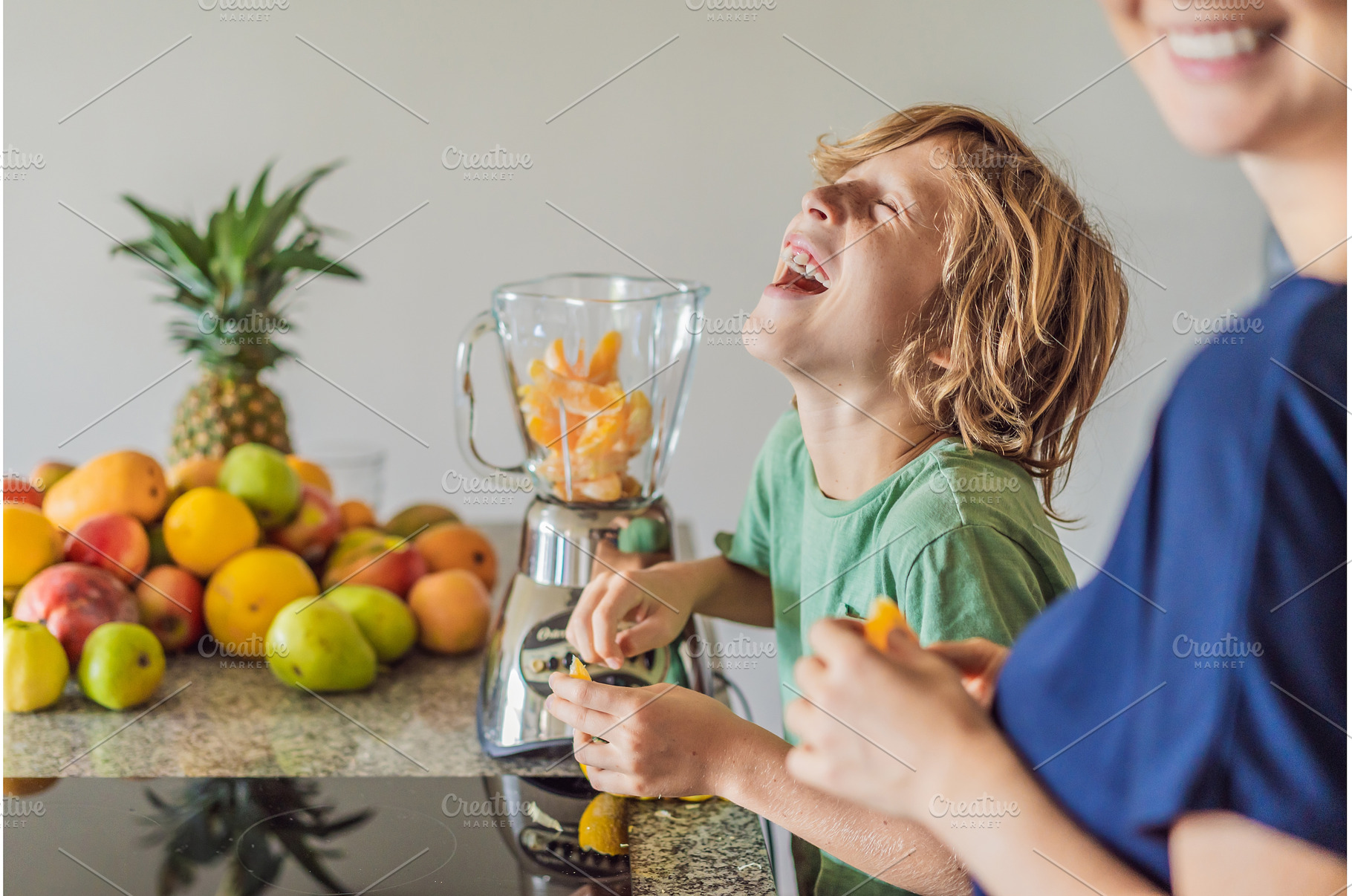 Mother and son cooking together in, a Person Photo by Elizaveta Galitskaya