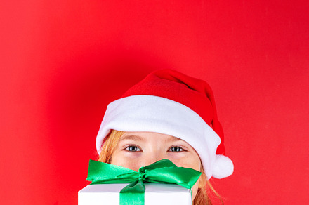 Christmas holiday background with funny girl, a Holiday Photo by Rimma