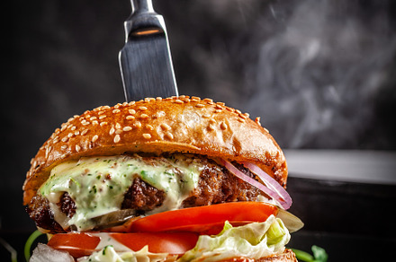 American cuisine concept a juicy me featuring hamburger, burger, and food
