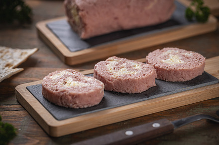Slices of savory meatloaf with egg filling, a Photo by Grafvision photography