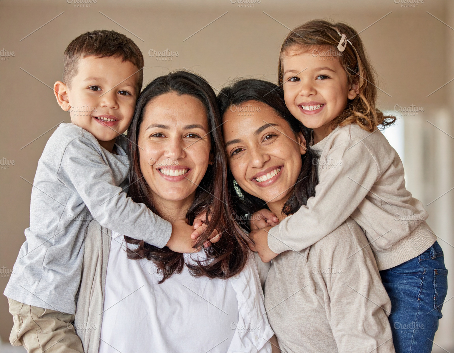 Diverse family smiling and hugging in a natural home setting, a Person Photo by DanFLCreativo