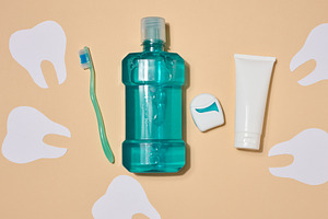 Oral hygiene set, mouthwash, toothbrush, toothpaste and dental f, a Health & Medical Photo by ndanko
