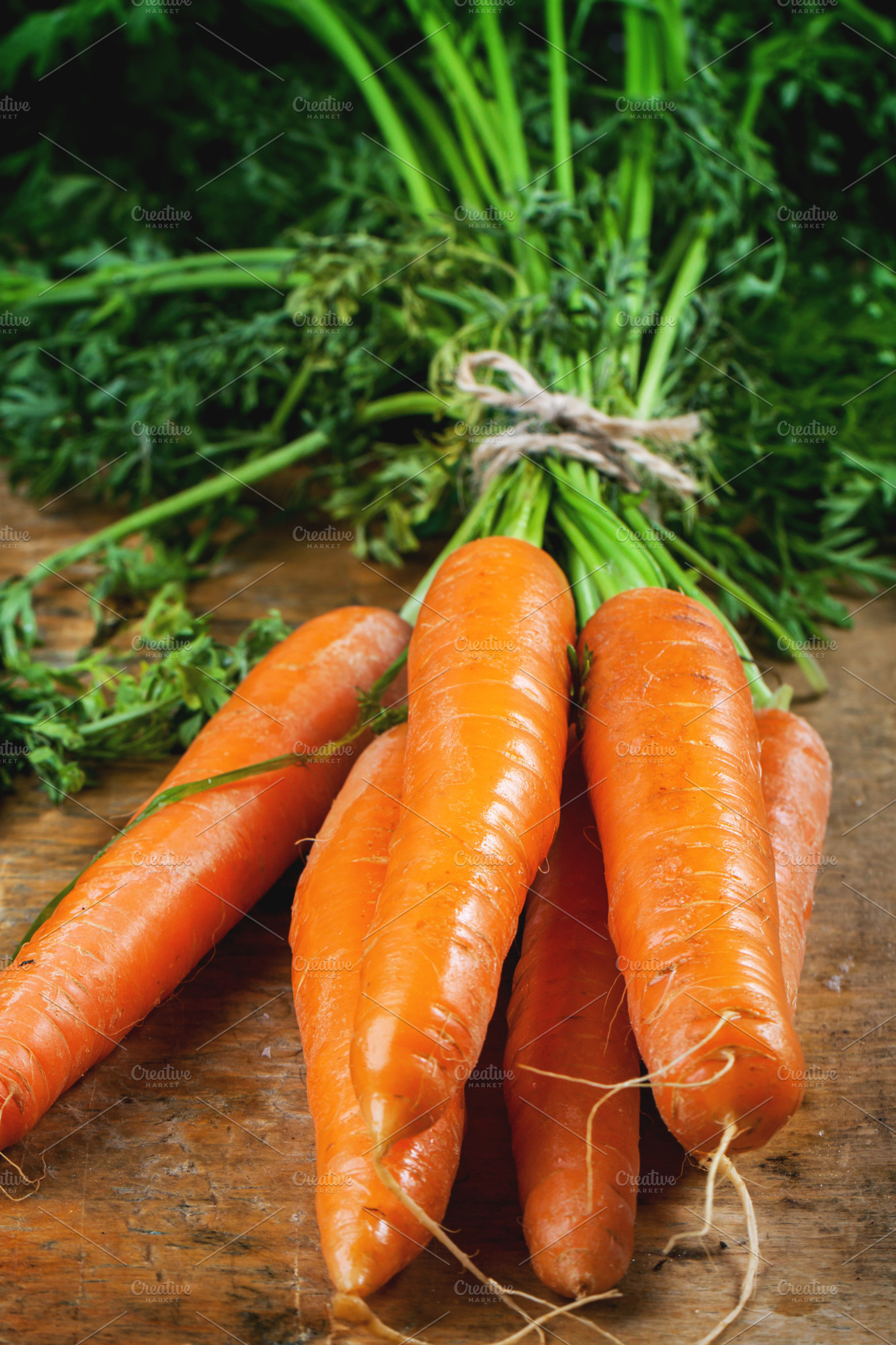 Bunch of carrots containing carrots, carrot, and organic