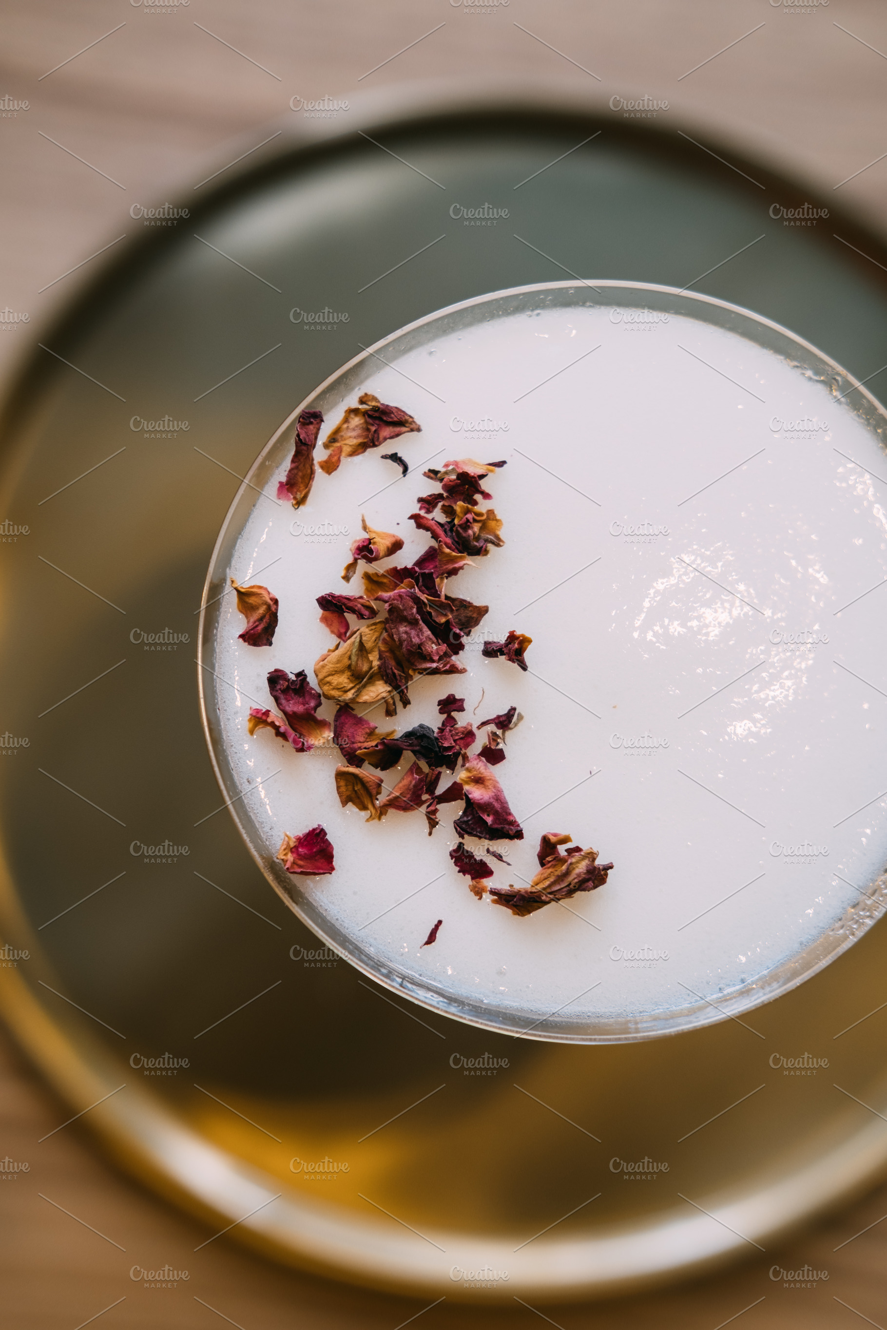 Frothy cocktail aperitif glass mixed drink tray, a Food & Drink Photo by Photo Drive Studio