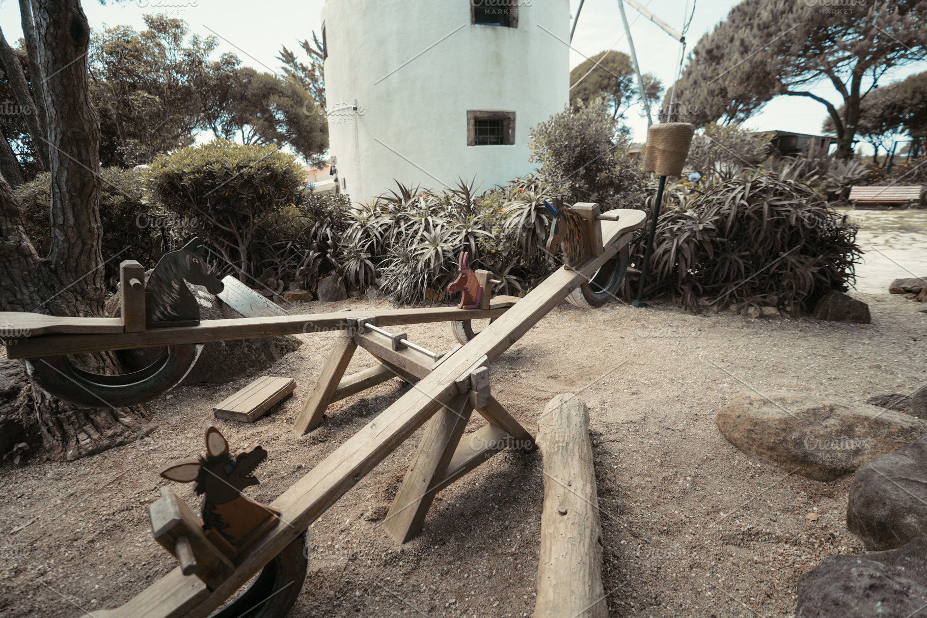 Rustic seesaw by countryside windmill, a Sports & Recreation Photo by SkyNext