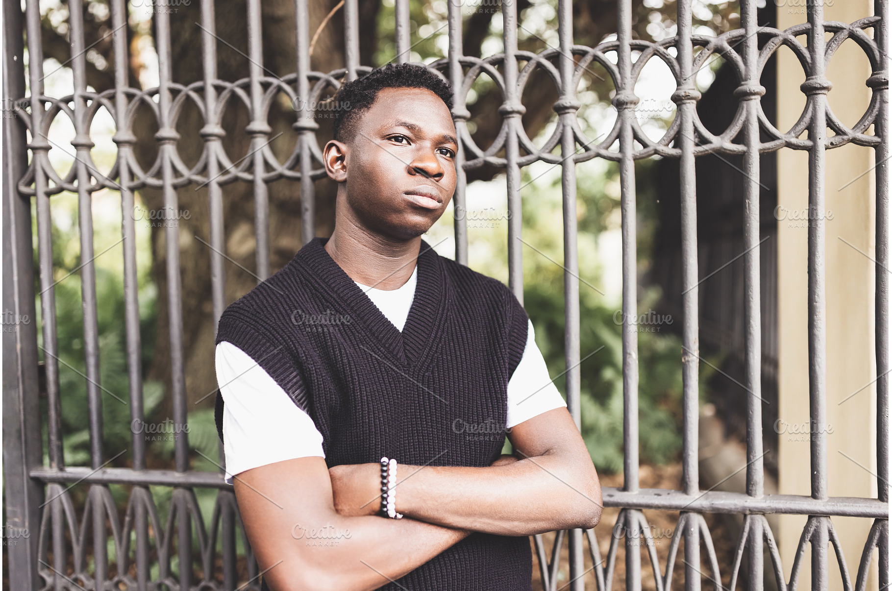 Confident Young African Man Leaning, a Person Photo by Lermont51