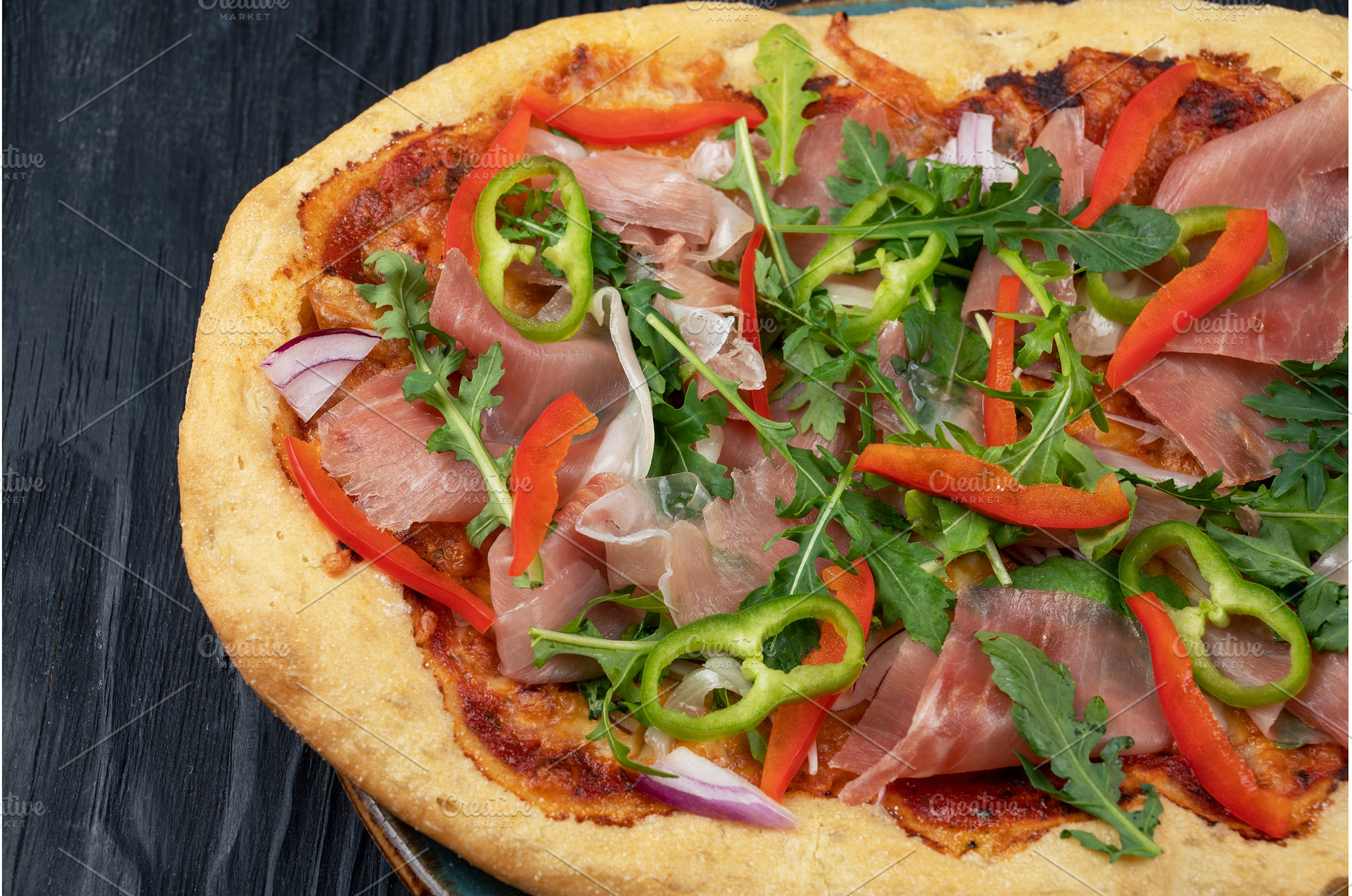 Italian Pizza on plate with jamon, a Food & Drink Photo by Jan Jack Russo Media
