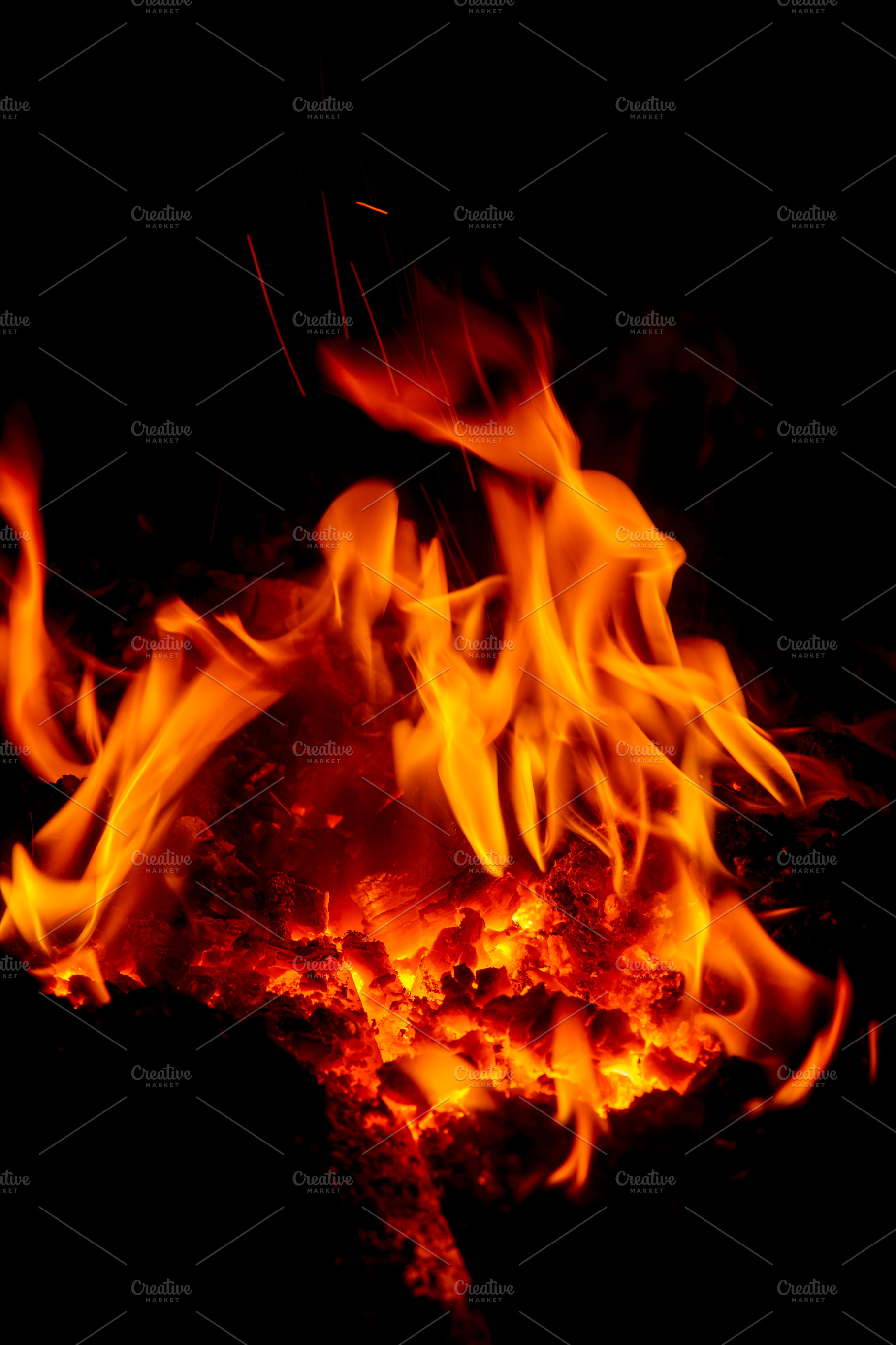Open fire abstraction on a dark background, a Background Photo by oleghz