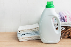 Detergent bottle, laundry and clean fresh towels
