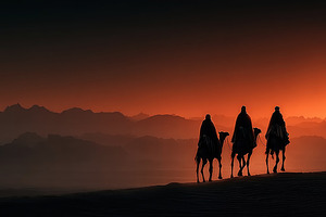 Three wise men on camels silhouetted against desert sunset with, a Holiday Photo by José Manuel Gelpi