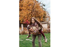 Father playing with daughter, a Person Photo by HalfPoint