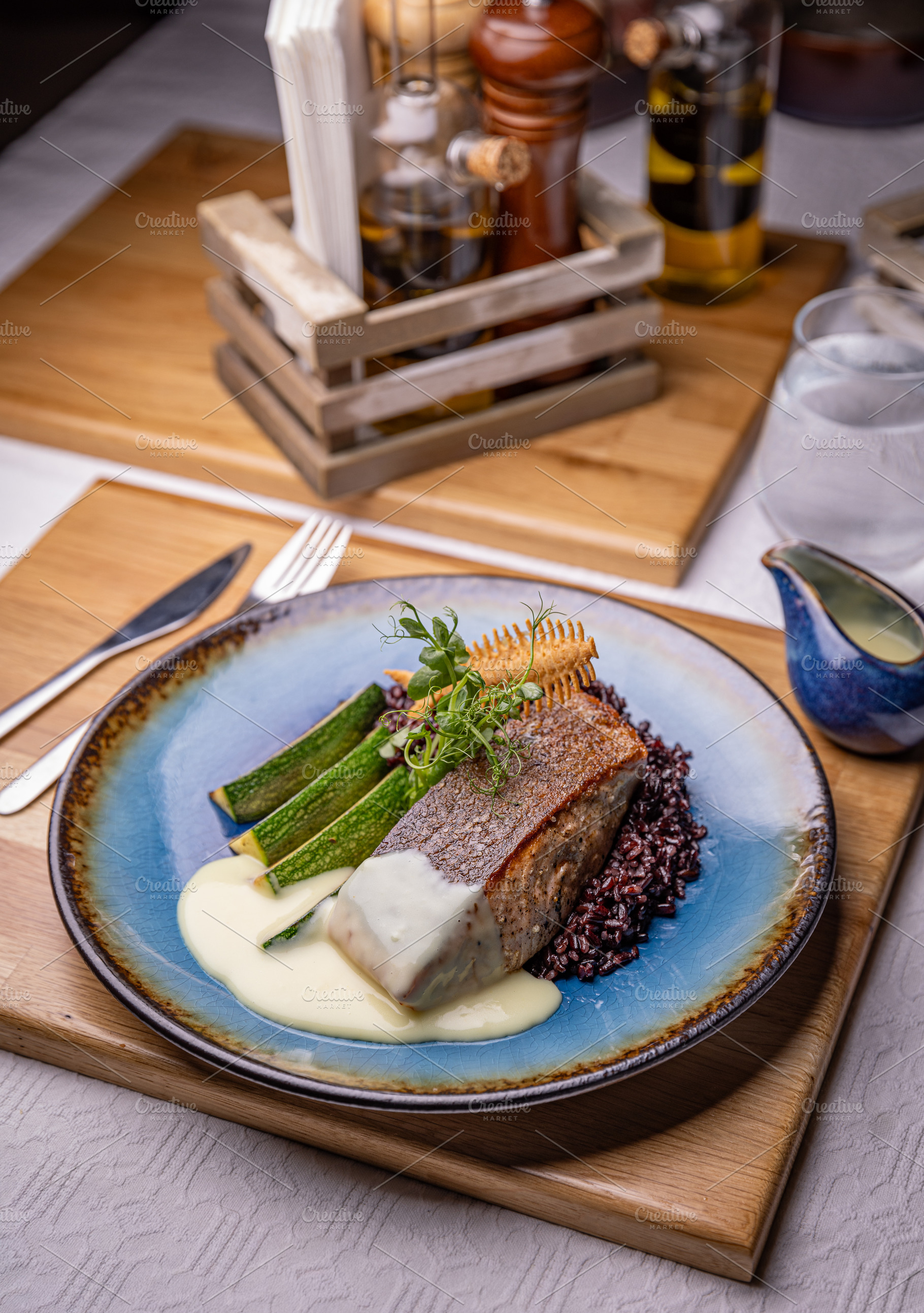 Salmon steak with zucchini slices, a Photo by Grafvision photography