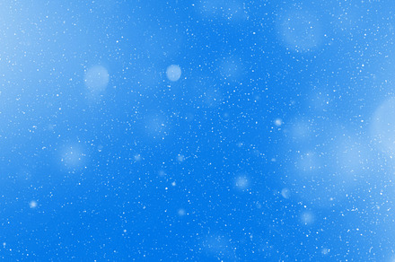 Snow flake particles on blue background, a Holiday Photo by GoodGoods