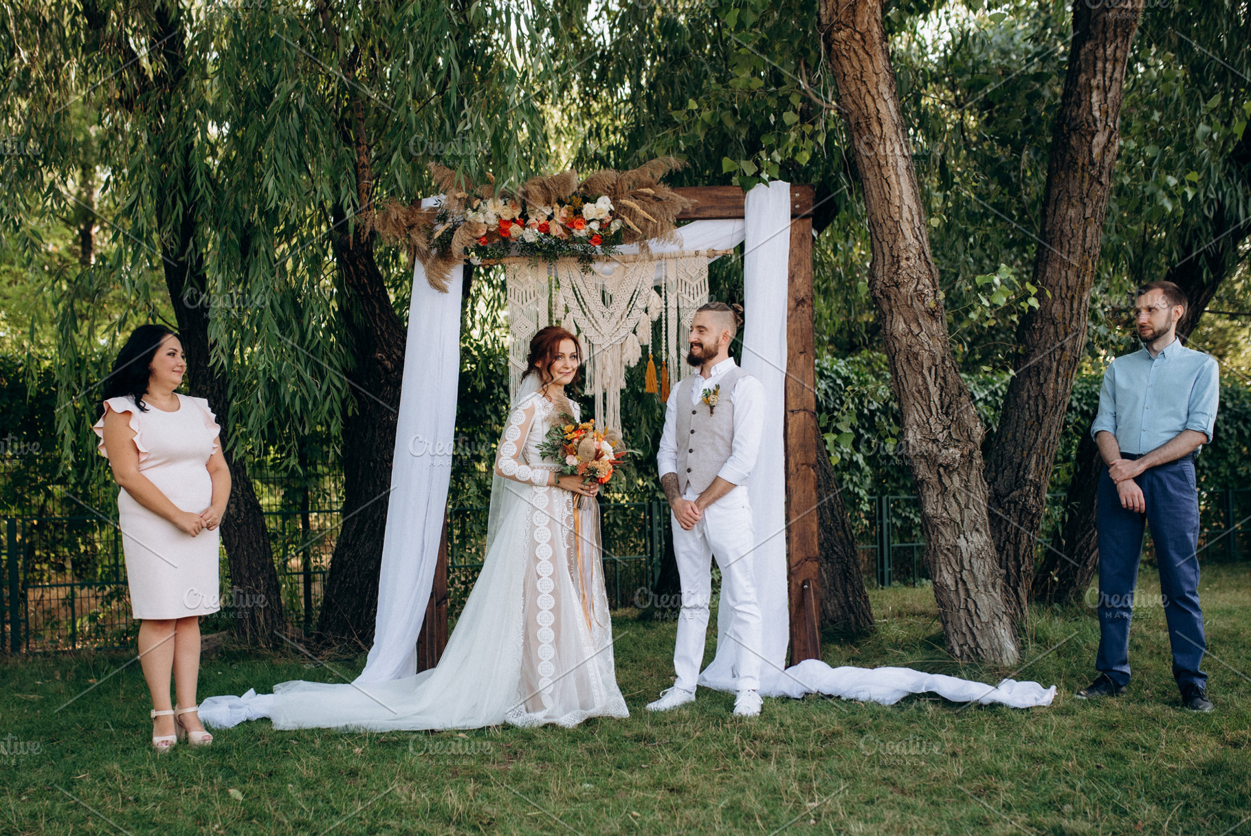 wedding ceremony of a young couple in love on a green meadow, a Person Photo by Weddings, People, Travel