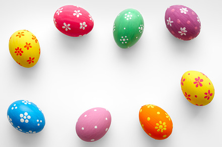Colorful easter eggs containing greeting, above, and art, a Holiday Photo by chamillewhite