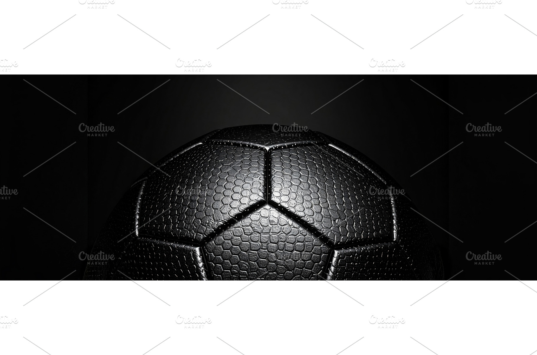 A black textured soccer ball under, a Technology Photo by Igor Tichonow