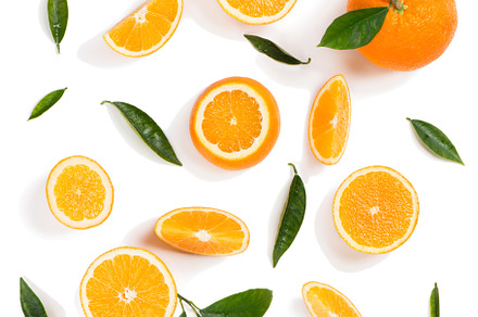 Oranges with leaves. Above view.