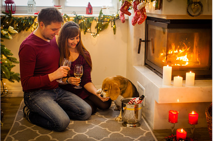 Young couple near the fireplace at, a Person Photo by oksix