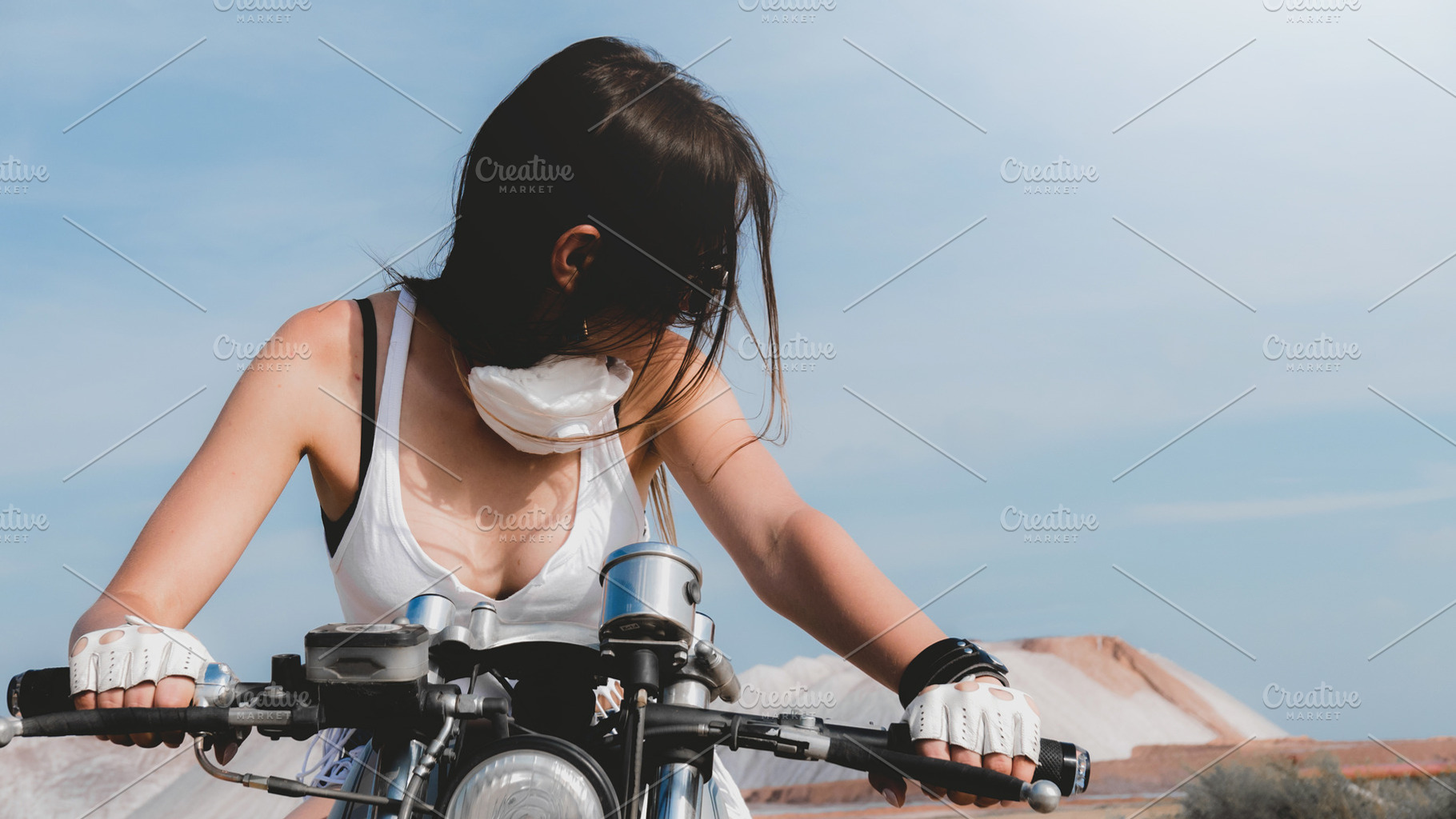 Sexy female on a motorcycle, a Transportation Photo by supamotion