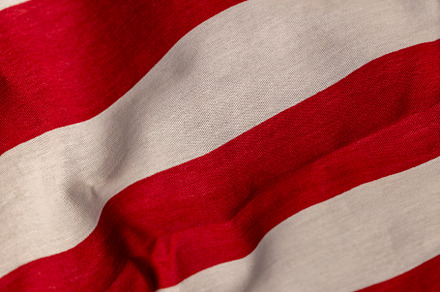 part of the American flag with stars and red and white stripes, a Photo by MyPhotos