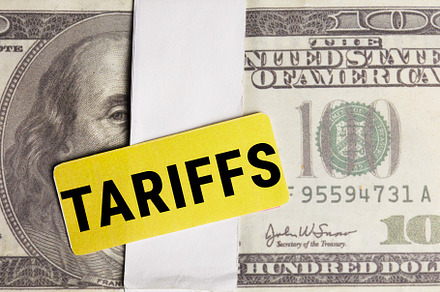 Tariff Costs Visualized on Hundred Dollar Bill, a Business Photo by Alliance Images