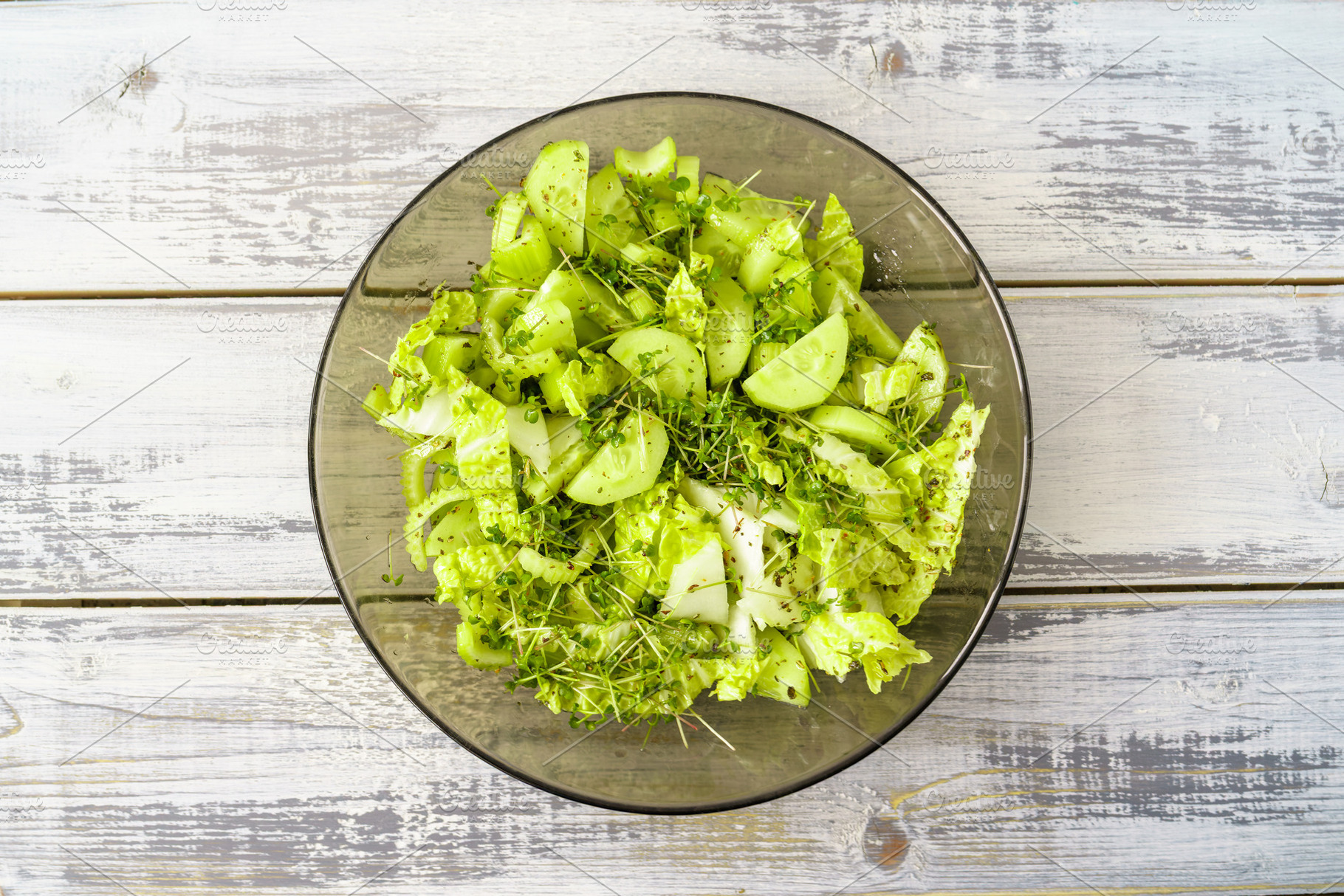 Fresh green microgreen salad on a light blue plate. A natural and organic conce, a Food & Drink Photo by Eugene_Photo