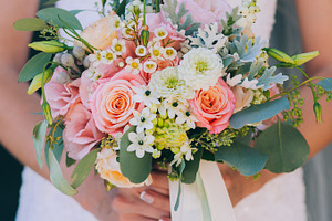Wedding bouquet containing bouquet, pink, and green