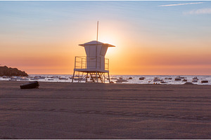 Beach at sunrise in Tossa de Mar, an Architecture Photo by kavalenkava