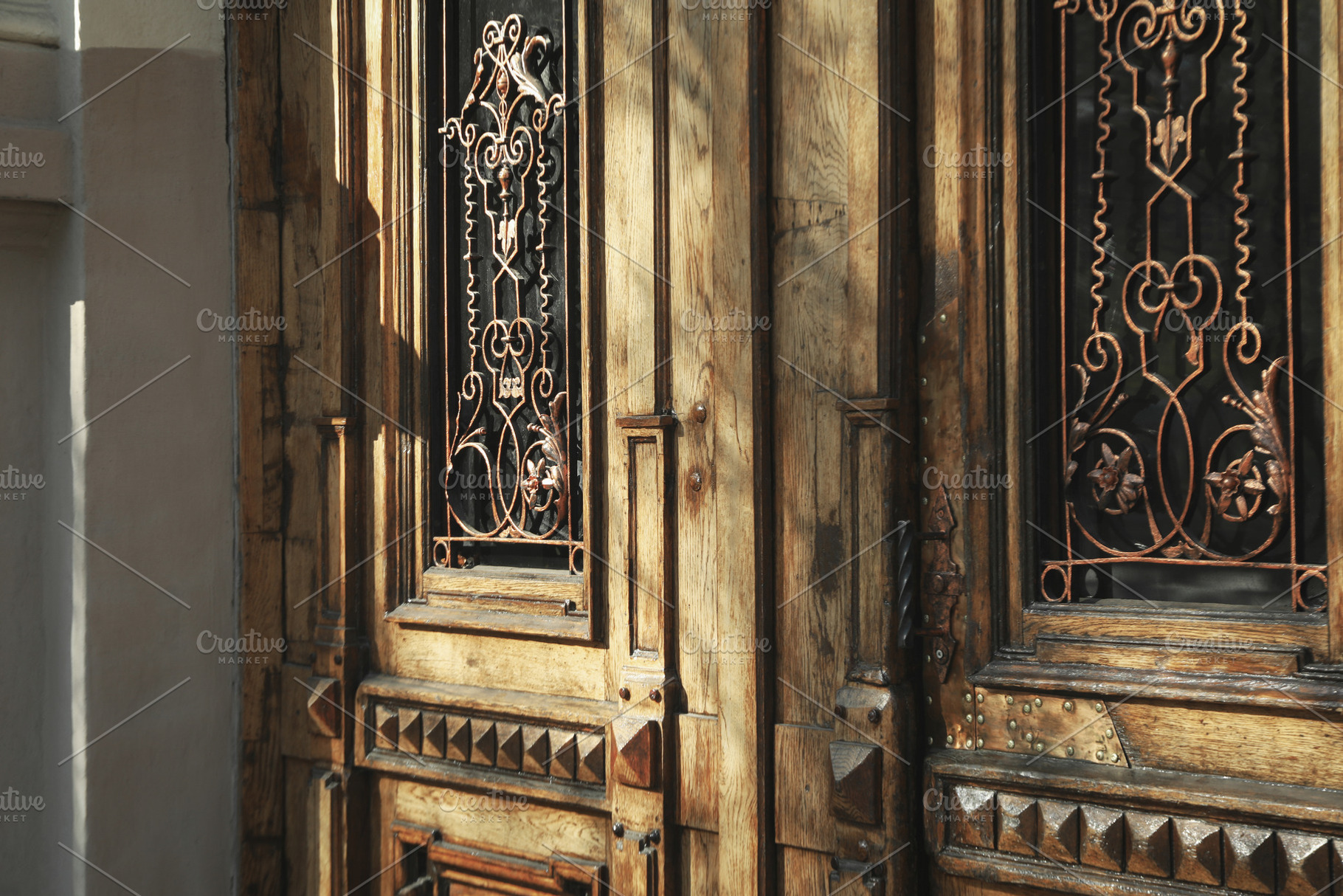 Old wooden doors in beautiful old city, an Abstract Photo by AtlasStudio PRO