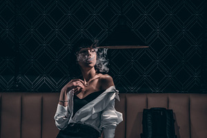 elegant girl smokes