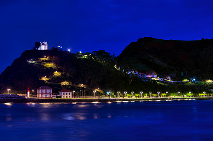 Ribadesella with Hermitage of Guia on a blue hour.