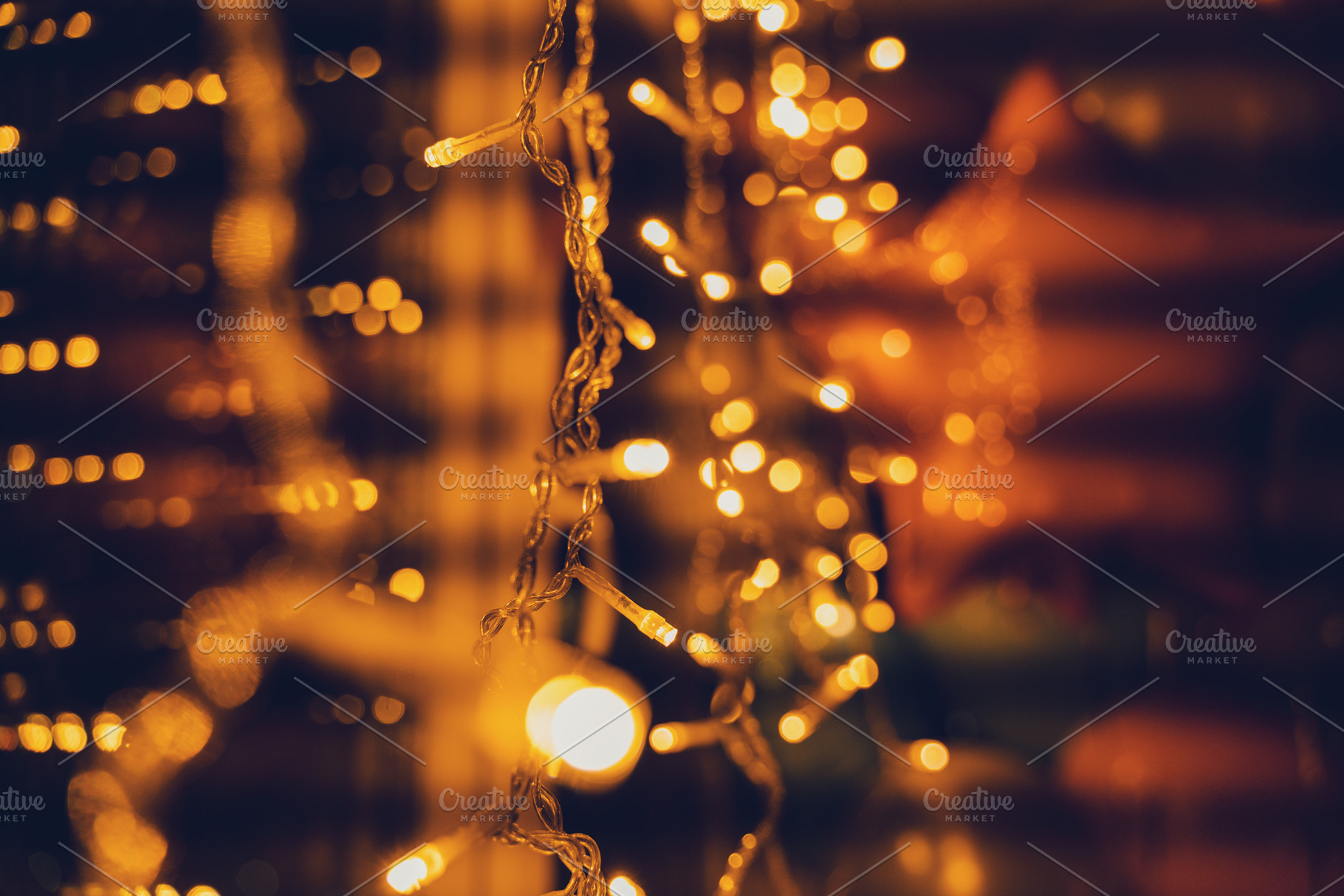 Glowing golden electric garlands, an Abstract Photo by Olezzo