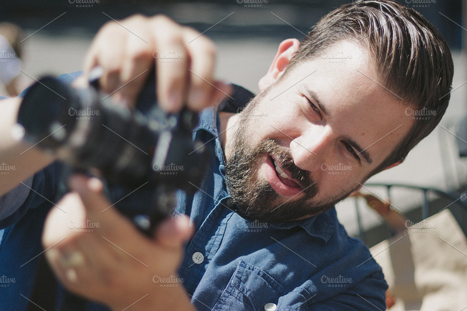 A Man Taking A Photo