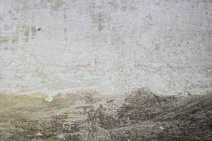 Textured concrete wall with stains, a Background Photo by Edalin's Store