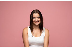 Young brunette woman in white tank, a Person Photo by volodymyrshtun13795