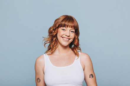 Portrait of a happy woman with ginger hair, a Person Photo by Jacob Lund
